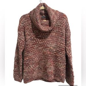 Cozy pink blend turtleneck sweater made in Italy.